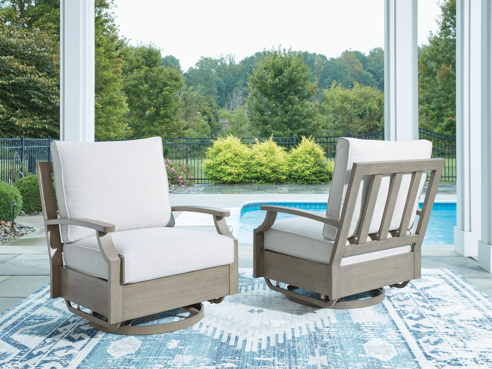 2338-rainier-ranch-swivel-glider-chair-with-cushion-brown-beige-2.webp Rainier Ranch - Swivel Glider Chair With Cushion - Brown / Beige