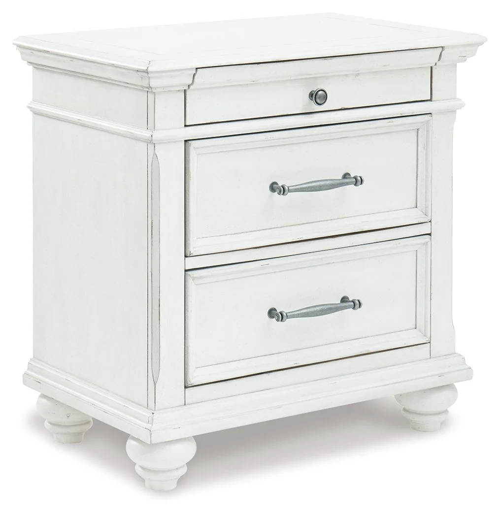 4700-kanwyn-three-drawer-night-stand-whitewash-1.webp Kanwyn - Three Drawer Night Stand - Whitewash