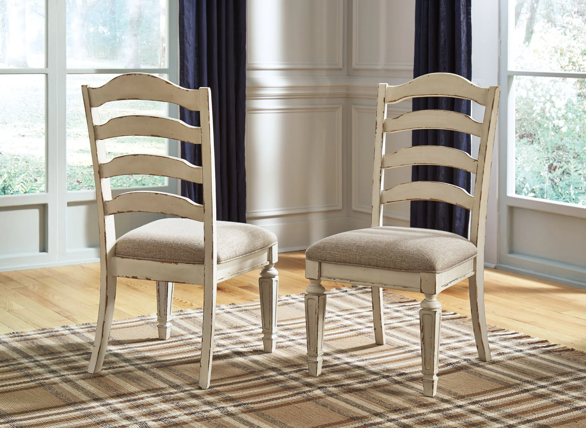 5454-realyn-dining-uph-side-chair-set-of-2-ladderback-chipped-white-9.webp Realyn - Dining UPH Side Chair (Set of 2) - Ladderback - Chipped White