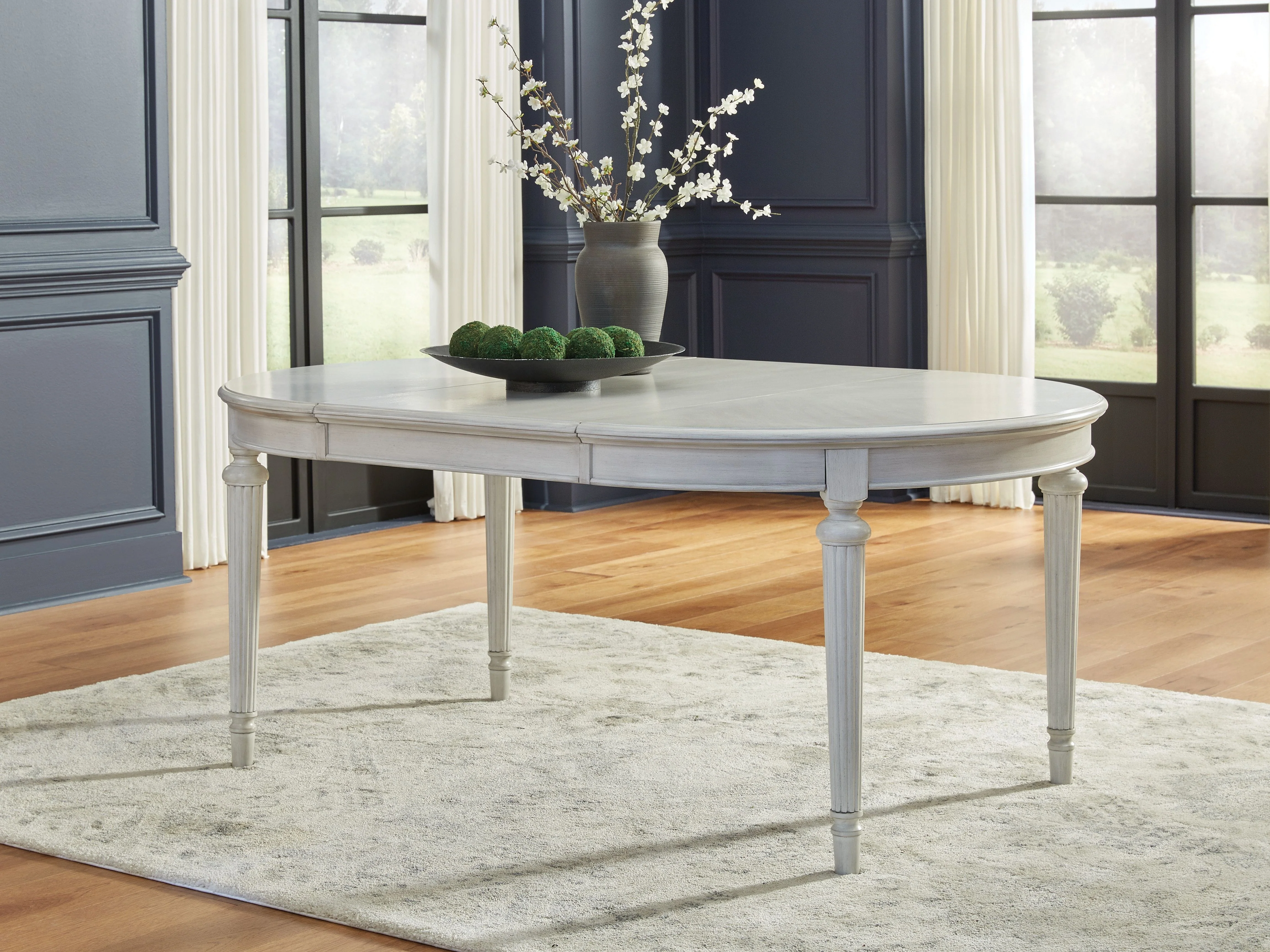 7964-montelaine-oval-dining-room-extension-table-antique-white-7.webp Montelaine - Oval Dining Room Extension Table - Antique White