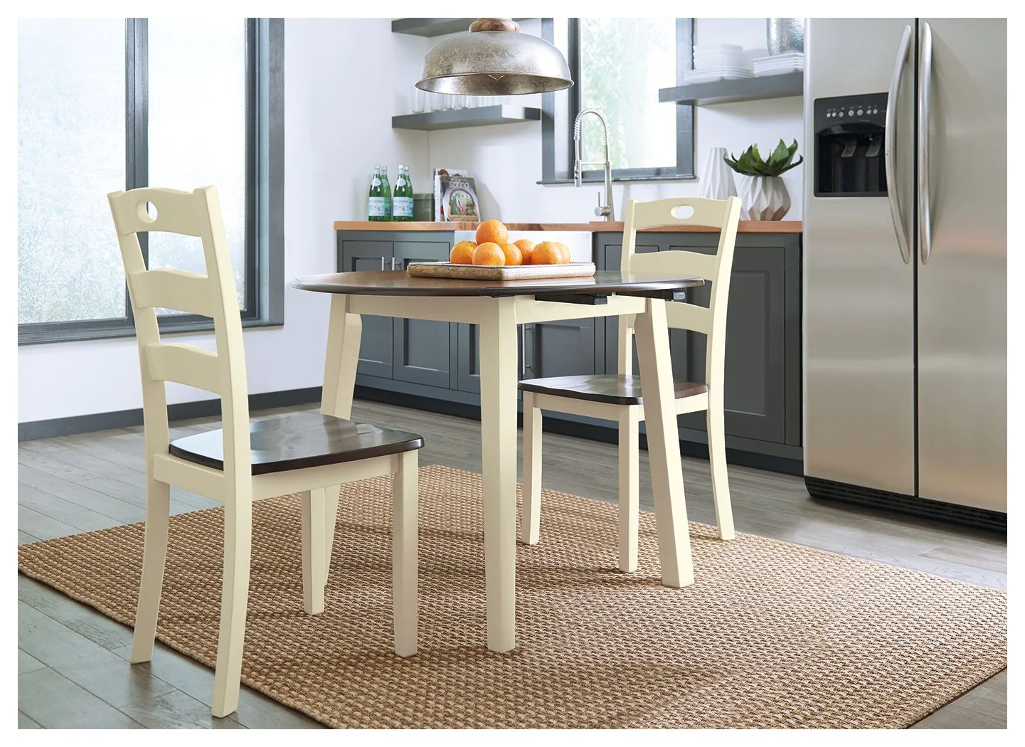 8199-woodanville-round-drm-drop-leaf-table-cream-brown-1.webp Woodanville - Round DRM Drop Leaf Table - Cream / Brown