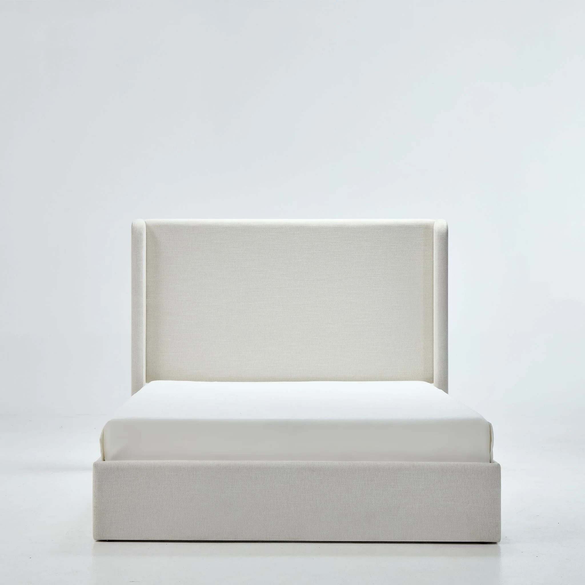 Caron - Upholstered Wingback Bed With High Headboard